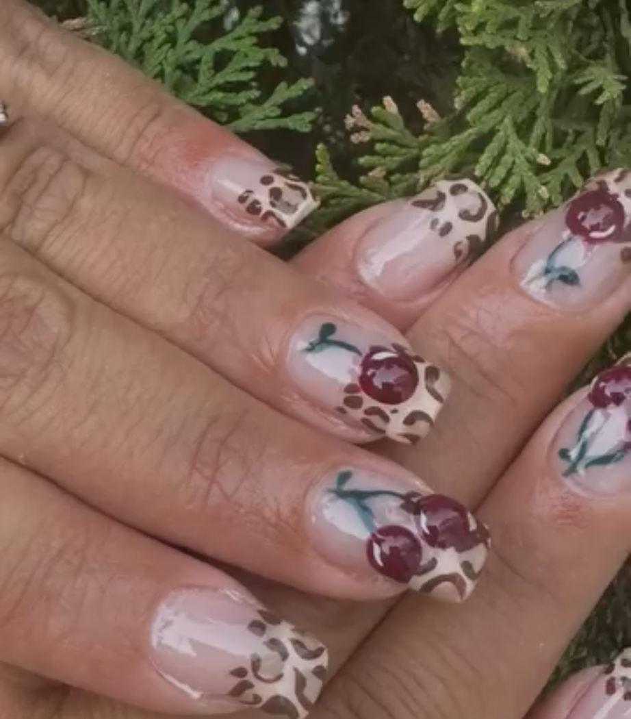 Leopard print tips with hand-painted cherries