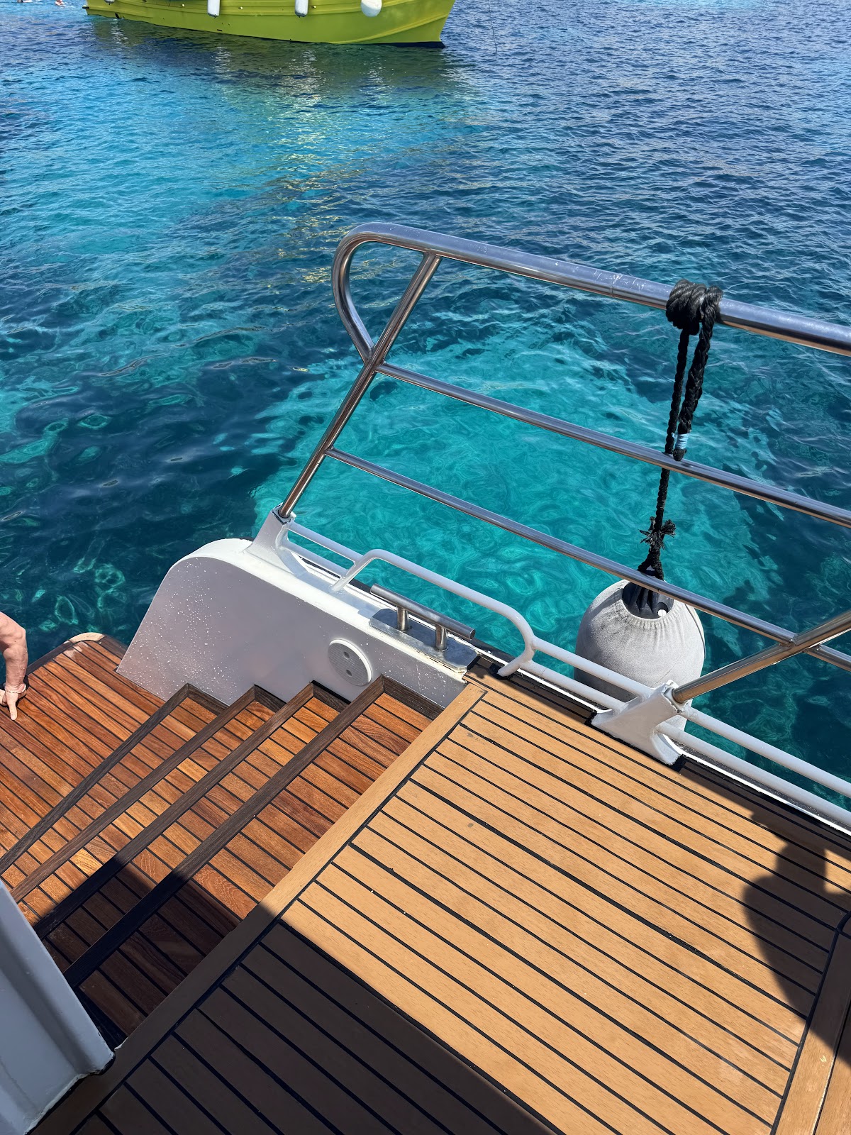 Clear-water charter and swim-stop imagery